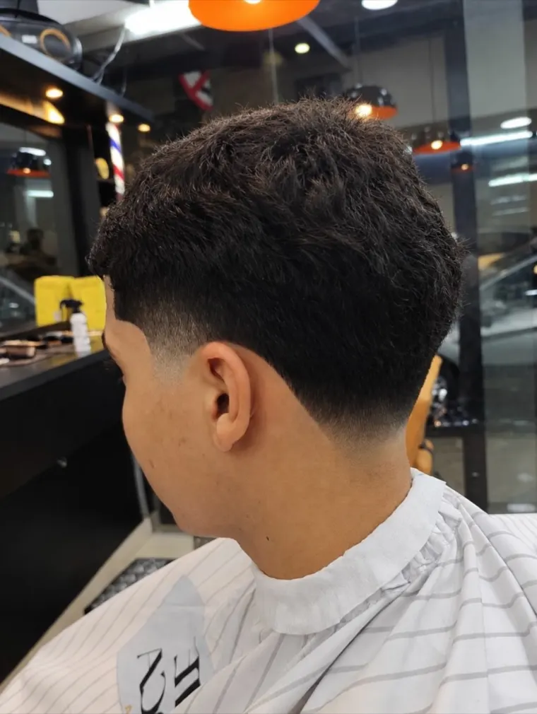 Cliente com volume no topo e degradê